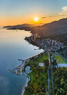 West Vancouver shoreline at sunset with Ambleside Park in foreground