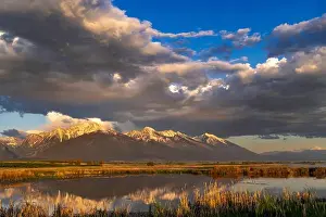 Chuck Haney Prints: Wetlands pond reflects the Mission Mountains at sunset at the Ninepipe National Wildlife Refuge near Ronan