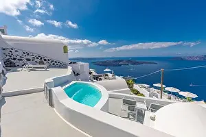 White architecture on Santorini island, Greece. Swimming pool in luxury hotel. Beautiful view on the sea, summer vacation, travel destination stunning