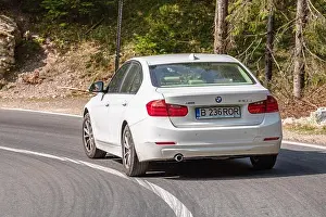 Acceleration Prints: White BMW 320d on road in Bihor, Romania, 2020