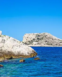 Calm Waters Prints: White cliffs on a sunny day in the Bay of Marseille in the Mediterranean Sea near Marseille