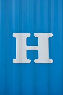 Blue Background Prints: White letter H on blue background