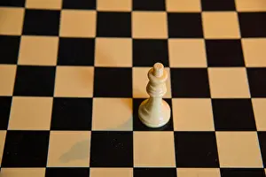 White queen on empty chess board