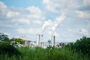 Vapor Prints: White smoke comes out from smokestacks or exhaust pipes in the factory chimneys emit water vapor which condenses into a