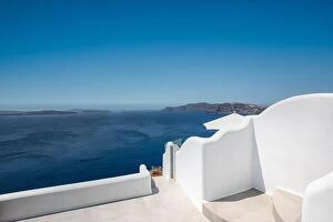 Images Dated 25th July 2021: White wash staircases and entrance on Santorini Island, Greece. The view toward Caldera sea view