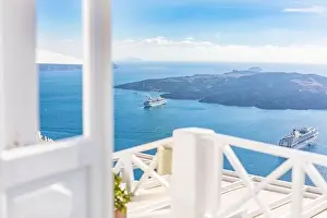 White wash staircases on Santorini Island, Greece. The view toward Caldera sea with cruise ship awaiting. Luxury summer travel, dream vacation