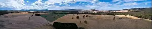 Wide aerial panorama fo scenic fields and hills in Victoria, Australia