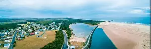 Wide aerial panorama of Harrington township and ocean coastline. Harrington, New South Wales, Australia