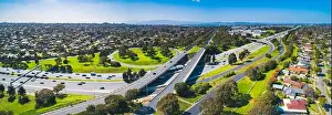 Interchange Prints: Wide aerial panorama of highway interchange on sunny day