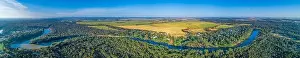 Wide aerial panorama of long stretch of Murray River in scenic countryside