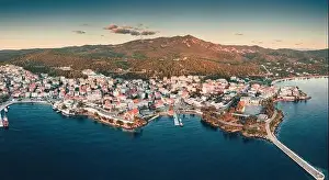 Wide aerial panoramic sunset view of a resort sea town Neos Marmaras in Halkidiki