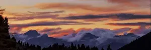 Tops Prints: Wide angle panorama silhouette forest and mountain tops in red orange blue clouds gradient sunset