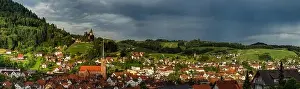 Wide hires panoramic landscape view of green valley in Schwartzwald. Green hills with vineyards and old medieval castle