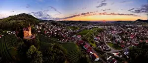 Wide hires panoramic landscape view of green valley in Schwartzwald at sunset. Beautiful sky and evening in the village