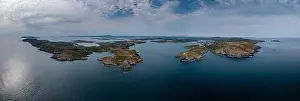 A wide panorama landscape of the islands and coastline of Baltimore Harbor in West Cork County in Ireland
