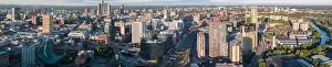 Very wide panoramic aerial image of Manchester and Salford city centres