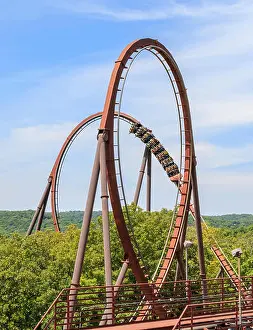 Exciting Prints: Wildfire, 12 story steel coaster with a top speed of 66 miles per hour and five loops