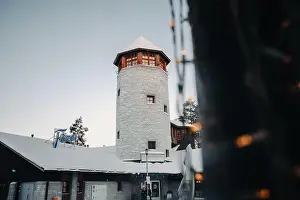 Northern Lights Prints: Wildlife park entrance tower behind fairy lights in Ranua, Lapland