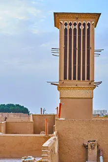 Adobe Prints: The wind tower or windcatcher (badgir) is the symbol of Yazd, located in hot dessert, Iran