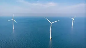 Wind Mill Prints: Wind turbine aerial view, Drone view at windpark westermeerdijk a windmill farm in the lake IJsselmeer
