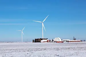Alternative Energy Prints: Wind Turbines From The Elk Wind Energy Farm Rising Above A Farm And The Snow Covered Landscape Near Greeley