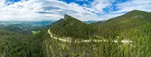 Serpentine Road Prints: Winding track is like slopes of Rhodope Mountains with forests. Panorama, top view