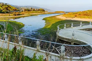 Malibu Prints: Winding walkway alongside Malibu Lagoon featuring lush greenery and tranquil water