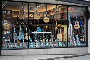 Guitars Prints: window display of a guitar shop. Ipswich, UK