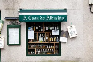 Casa Prints: A wine shop window in the town of La Toxa or La Toja in Galicia Spain