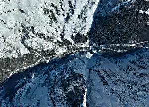 Pistes Prints: Winter drone shot of ski pistes and slopes covered with fresh powder snow in Tignes in Valdisere France