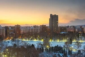 Images Dated 18th February 2017: Wintery city skyline in Sapporo, Japan over looking Nakajima Park at dawn