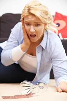 Red Wine Prints: Woman Accidentally Spilling Red Wine On Carpet At Home