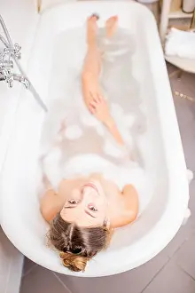 Beautiful Girl Prints: Woman bathing at the retro bathroom