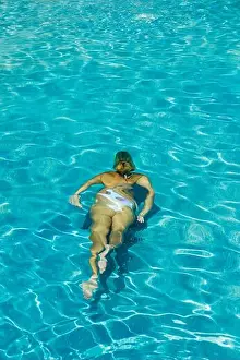 Bikini Prints: Woman in bikini at swimming pool underwater