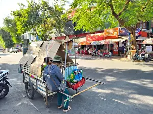 Destitute Prints: Woman with a child, waste picker or informal recycler in Phnom Penh