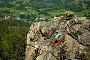 Ropes Prints: Woman climbing near the top with amazing areal view on the surroundings