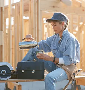 Building Site Prints: woman construction worker on building site