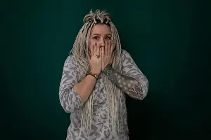 Despair Prints: A woman is covering her face with her hands