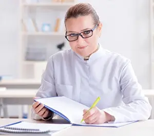 Fracture Prints: The woman doctor studying human skeleton