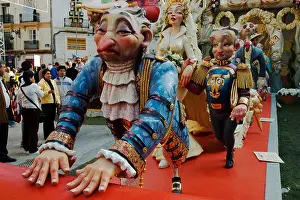 Masks Prints: Woman dominating a man, footmen rolling out the red carpet