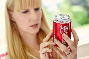 Quenching Prints: Woman drinking Coke from a tin