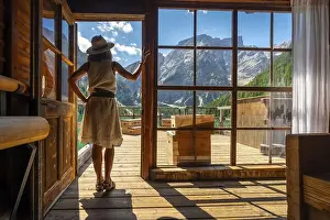 Light Skinned Prints: Woman enjoying breathtaking views of lake braies