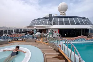 Middle Aged Prints: Woman enjoying the swimming pool on the cruise ship MSC Splendida