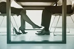 Colleagues Prints: Woman flirting with his colleague during work in office, closeup. Cheating concept