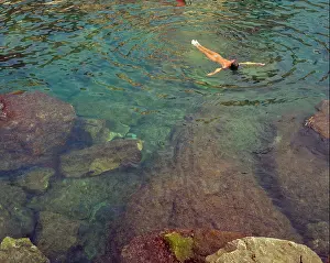 Adult Only Prints: Woman floating on her back in the water