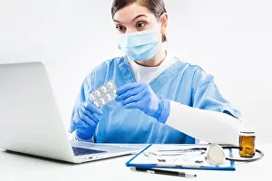 Counseling Prints: Woman GP doctor holding medicine prescribing patient therapy during online virtual appointment over laptop computer