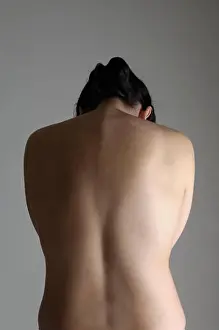 Body Care Prints: a woman on his back with gray background, head down