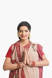 20 24 Years Prints: Woman greeting at Durga Puja