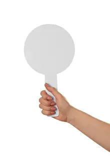 Buyer Prints: Woman holding blank auction paddle on white background, closeup. Space for text