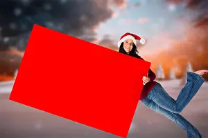 Snowing Prints: Woman holding a sign against festive background